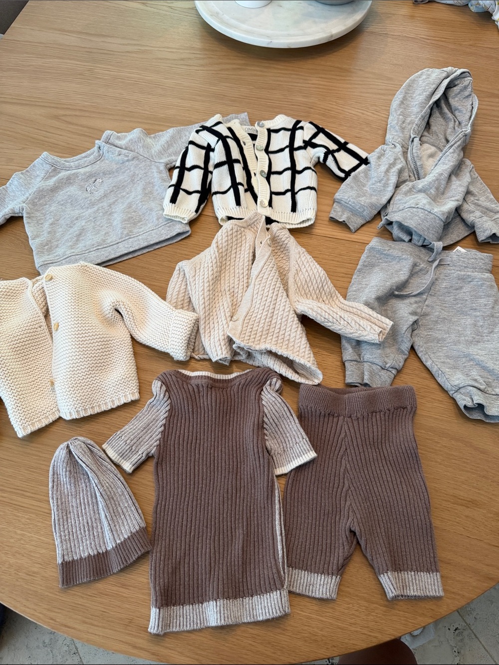 6 newborn / 0-3 month sweaters and 2 pants